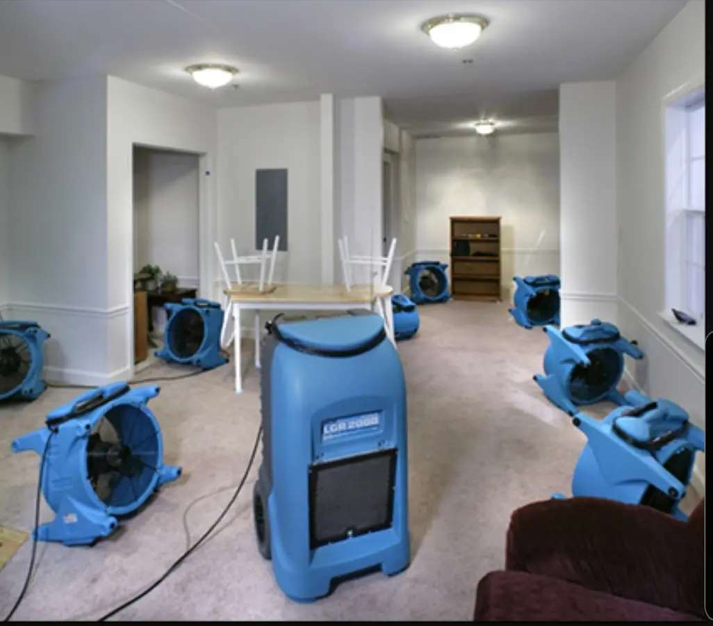 Air movers and dehumidifier setup for Water Extraction & Removal in Pineville